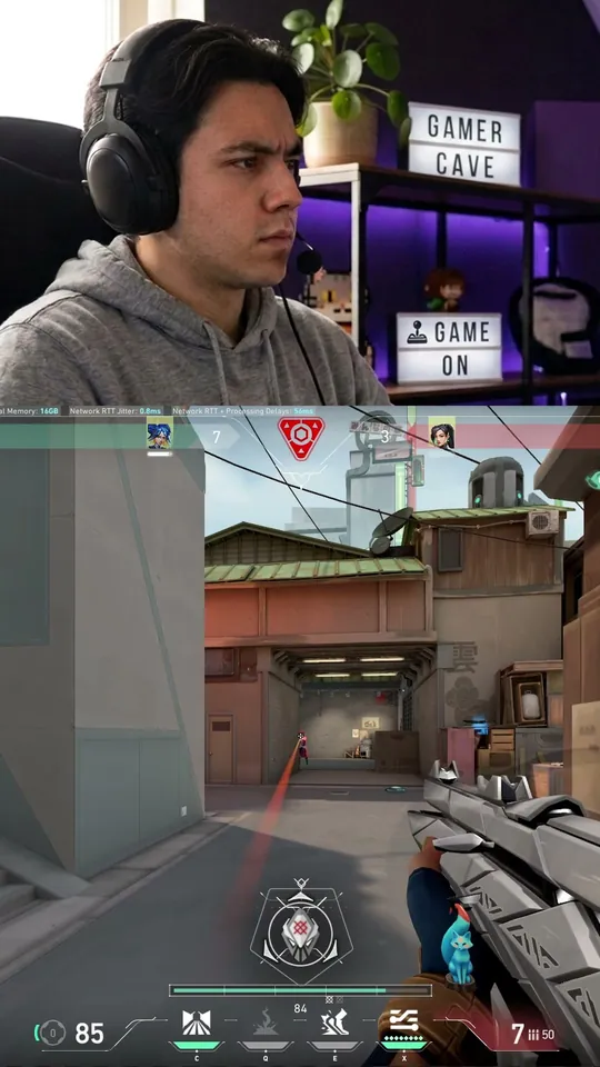 The clip reframed to vertical, facecam stacked over the gameplay